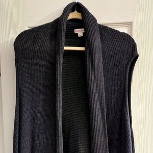Long sleeveless sweater